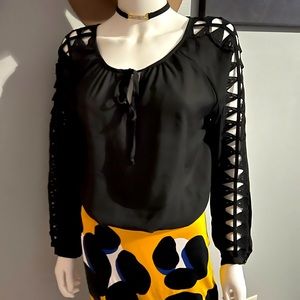 Woman’s long sleeve black blouse